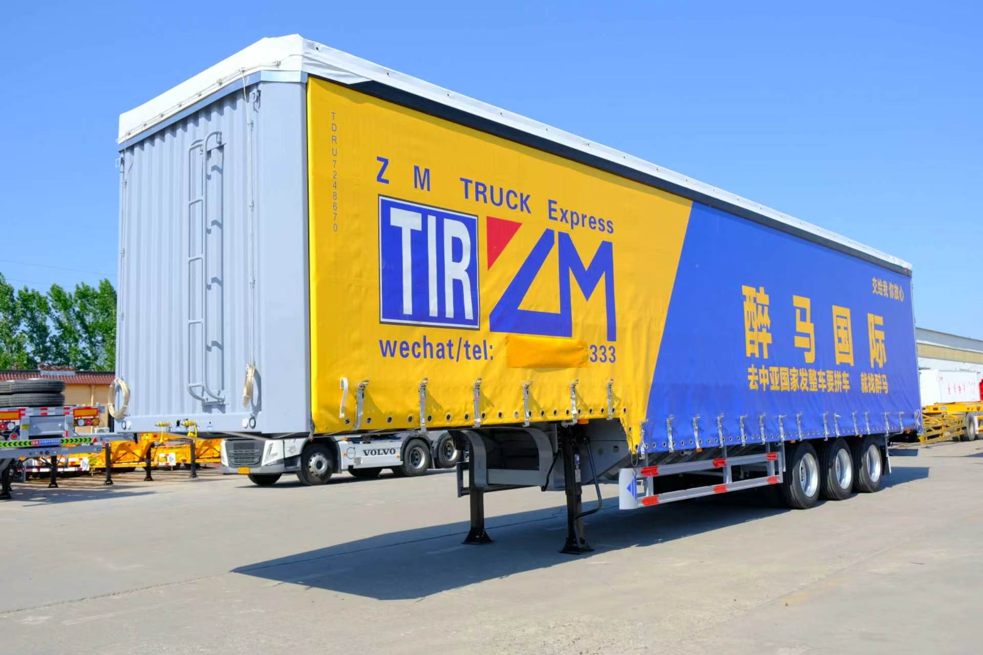 ZM CARGO blue and yellow freight trailer